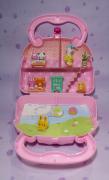 Mini doll house in handbag