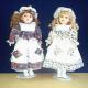 PS-1820 Blue- and Brown-Eyed Porcelain Dolls with Dress and Headgear in Different Colors