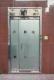 Stainless steel glazed door